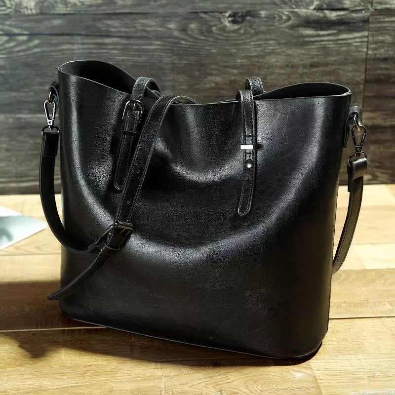 Stylish women's vintage leather crossbody shoulder bag in classic brown. Durable & spacious handbag.