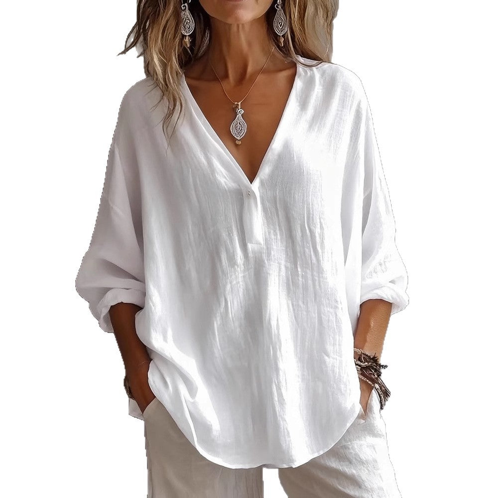 Loose solid color women's long-sleeve top, a comfort top for office attire or relaxed casual wear.