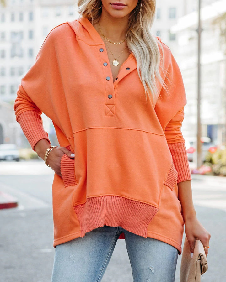 Women's love-themed long-sleeve hooded tunic sweatshirt, cozy, stylish, and perfect for casual wear.