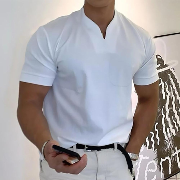 Crisp white men's classic polo shirt, perfect for smart casual & everyday refined style.