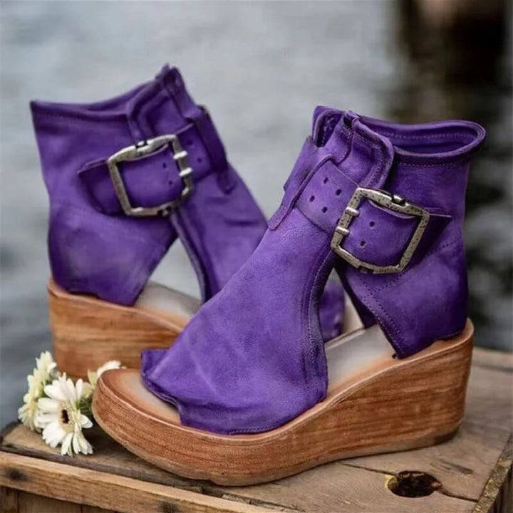 Casual women's distressed open-toe wedge sandals with ankle buckles, ideal for summer style & comfort.