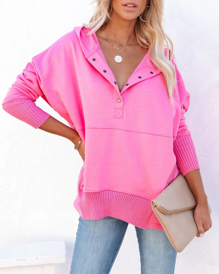 Charming love-themed women's hooded tunic sweatshirt, combining style and cozy comfort.