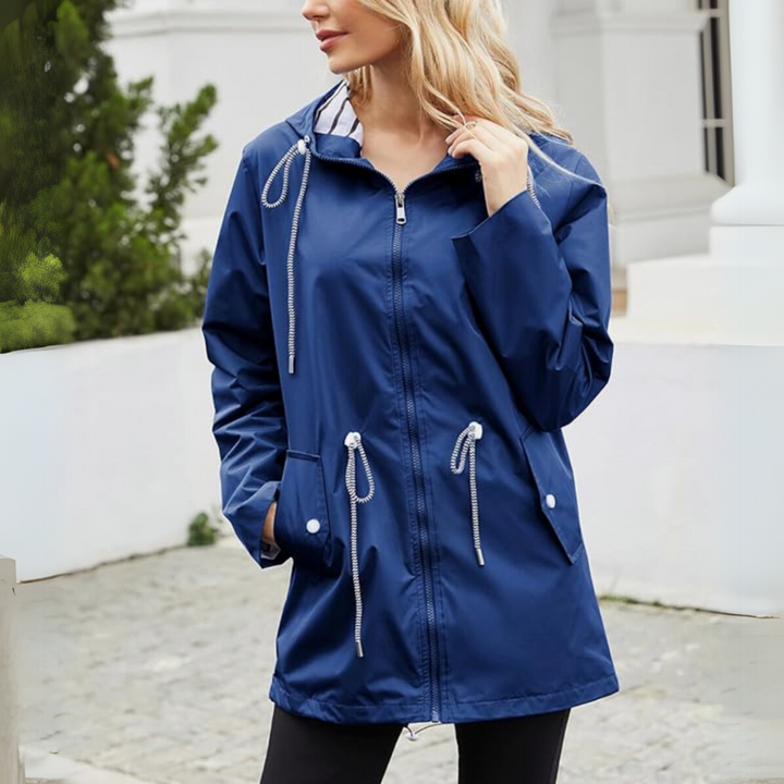 Everyday women's waterproof windbreaker, hooded and lightweight, for effective rain protection.