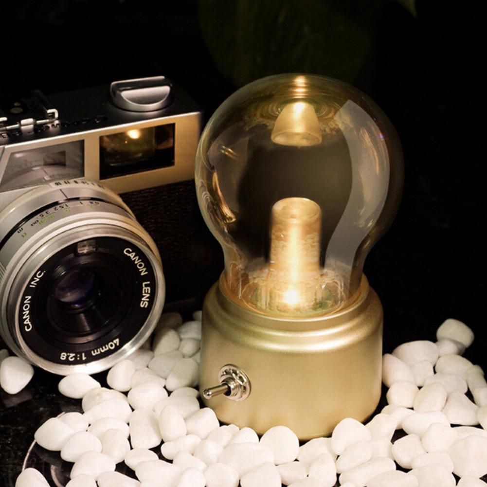 Retro LED Desk Lamp with warm glow, USB rechargeable & portable for vintage home decor.