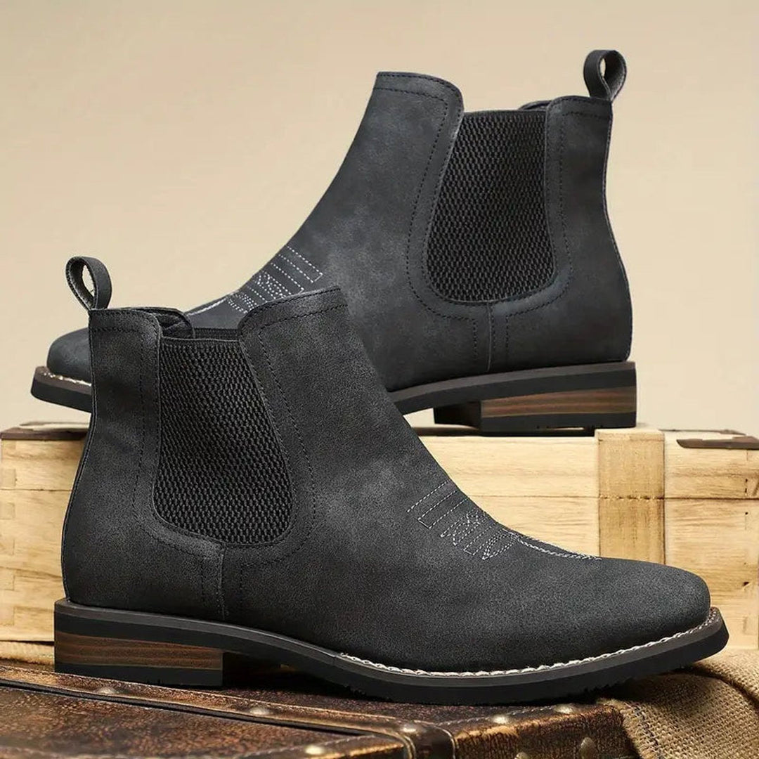 Smart and casual men's slip-on Chelsea boots, ideal for various outfits. Durable and fashionable ankle footwear.