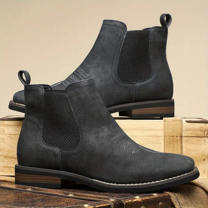 Smart and casual men's slip-on Chelsea boots, ideal for various outfits. Durable and fashionable ankle footwear.