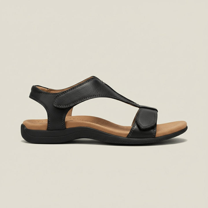 Women's T-strap orthopedic sandals worn, showcasing comfortable fit, foot support, and style.