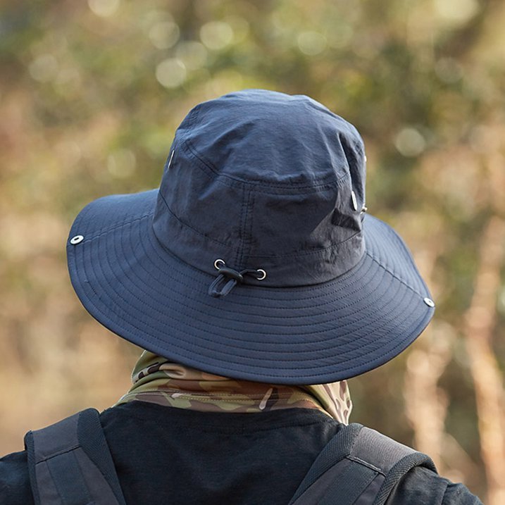 Unisex sun hat with UV protection for hiking & fishing. Breathable wide brim, perfect for outdoor adventures.