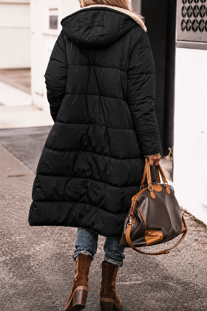 Versatile women's reversible coat, a stylish choice for any cold weather occasion.