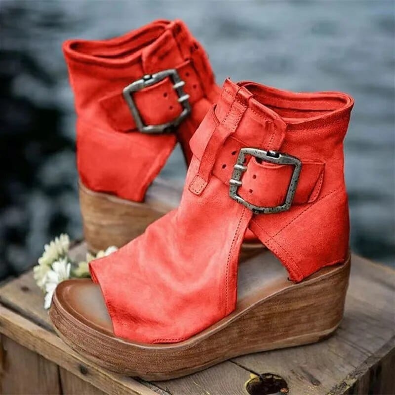 Trendy women's distressed open-toe wedge sandals feature elegant buckles, offering stylish & comfortable summer footwear.