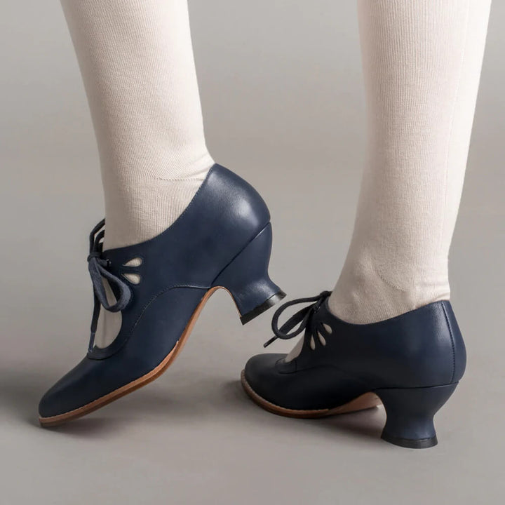Comfortable women's orthopedic heels with arch support for pain relief; stylish all-season footwear.