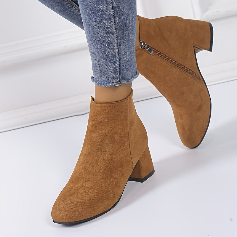 Versatile women's Chelsea ankle boots. Elegant design with comfortable block heel, ideal for fall & winter women's fashion.