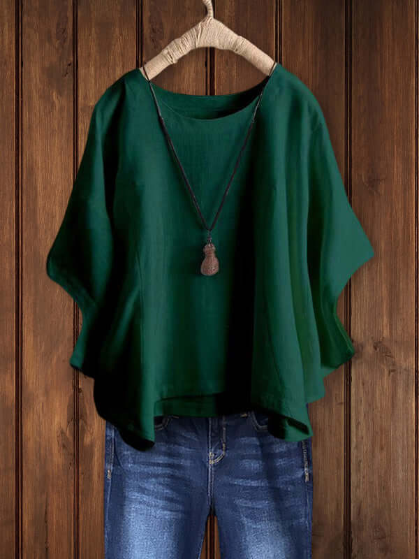 Women's effortless crew-neck dolman-sleeve tunic top. Relaxed fit for casual, comfortable everyday style.