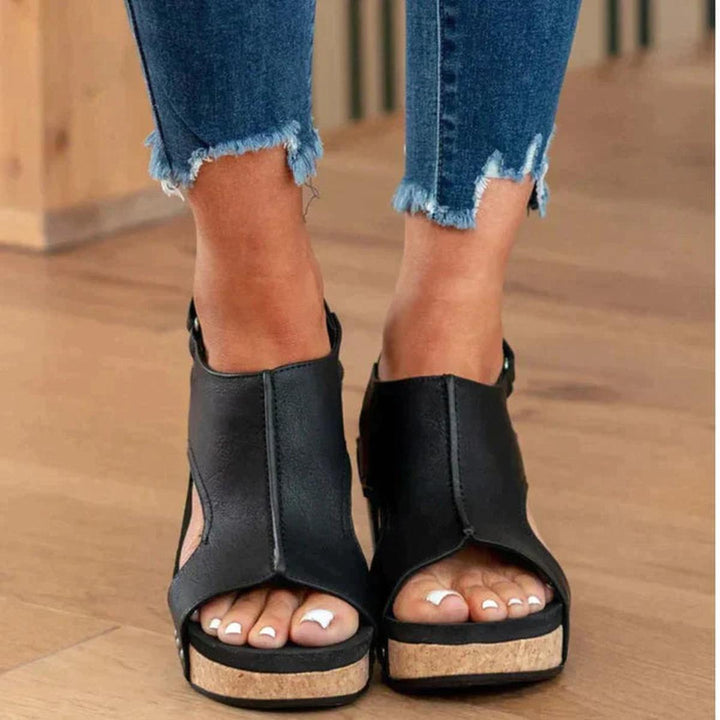Women's comfortable open-toe wedge sandals. Perfect slip-on summer footwear for elegant everyday style.