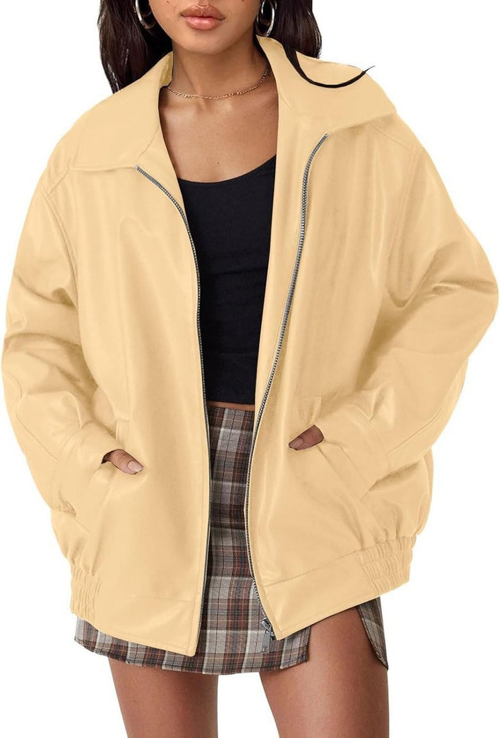 Women's zip-up oversized leather bomber jacket, relaxed fit, perfect for casual street style fashion.