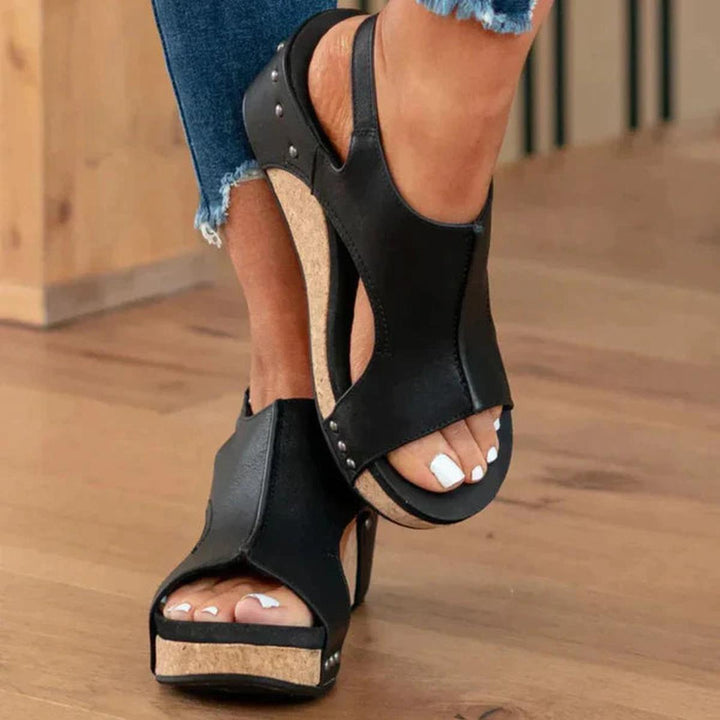 Elegant women's open-toe wedge sandals. Slip-on design offers summer comfort & a chic look for any occasion.
