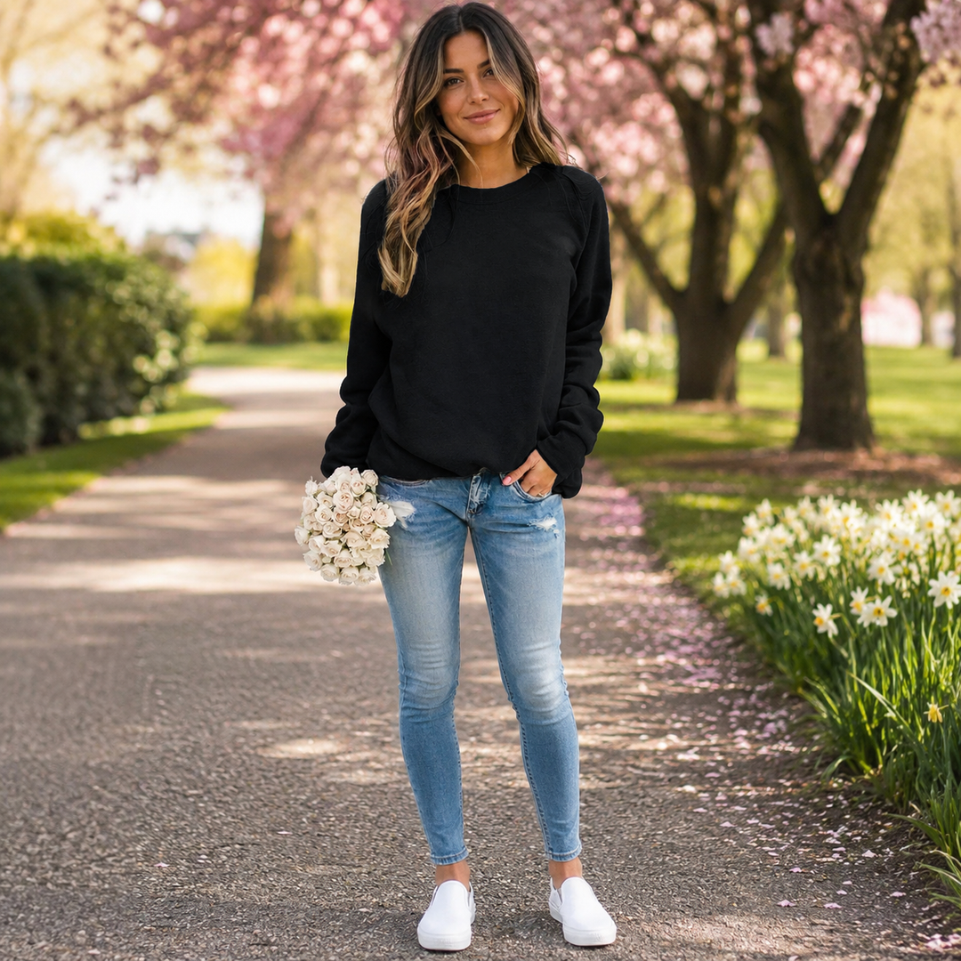 Comfortable women's relaxed fit crew neck sweatshirt, ideal for lounging or daily style.