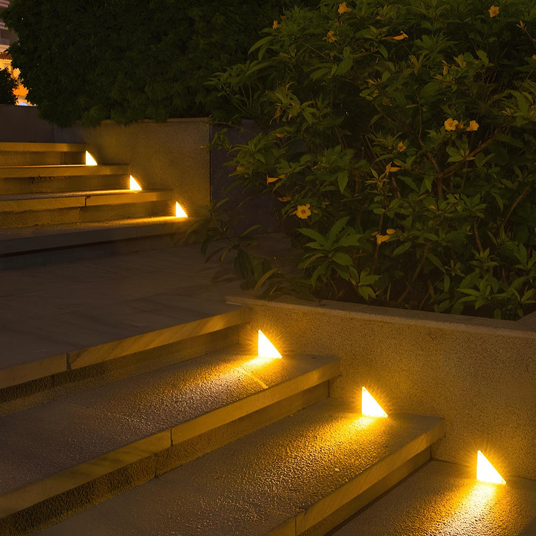 Side profile of a solar powered outdoor stair light, showcasing its low-profile design and easy installation.