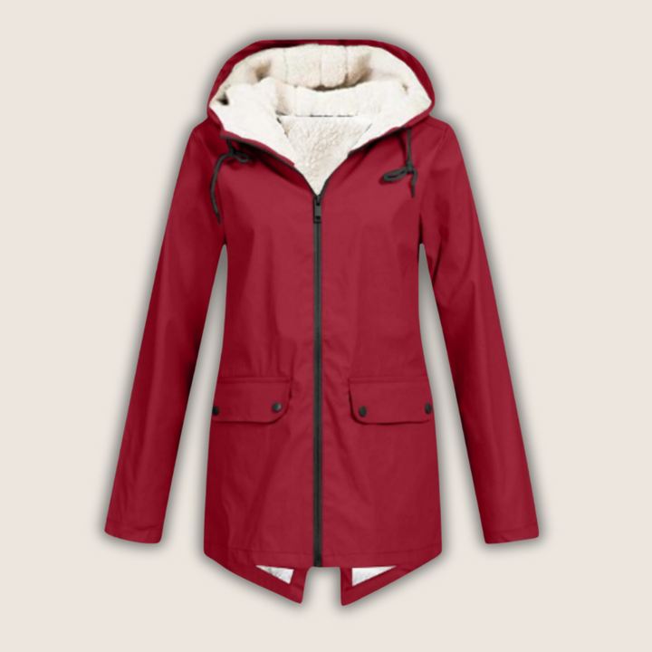 Women's waterproof rain jacket with an adjustable hood for all-weather protection & outdoor activities.