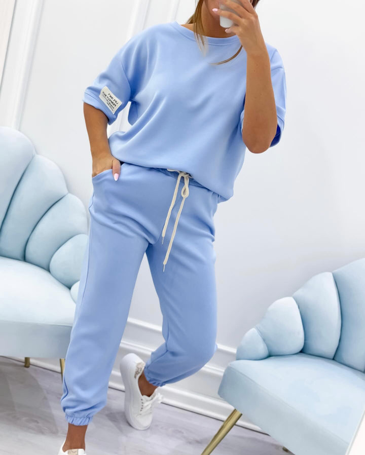 Elegant women's short sleeve set, a stylish two-piece for comfortable casual summer fashion.