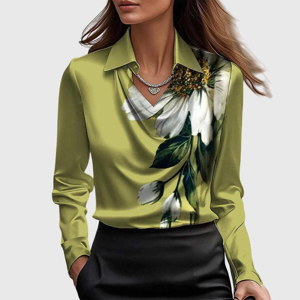 Women's elegant blouse featuring a unique pleated neckline. Flowing fit top, dressy for fashion.