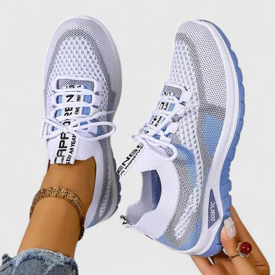 Women's lightweight comfort sneakers with cushioned support, perfect for everyday wear & walking.