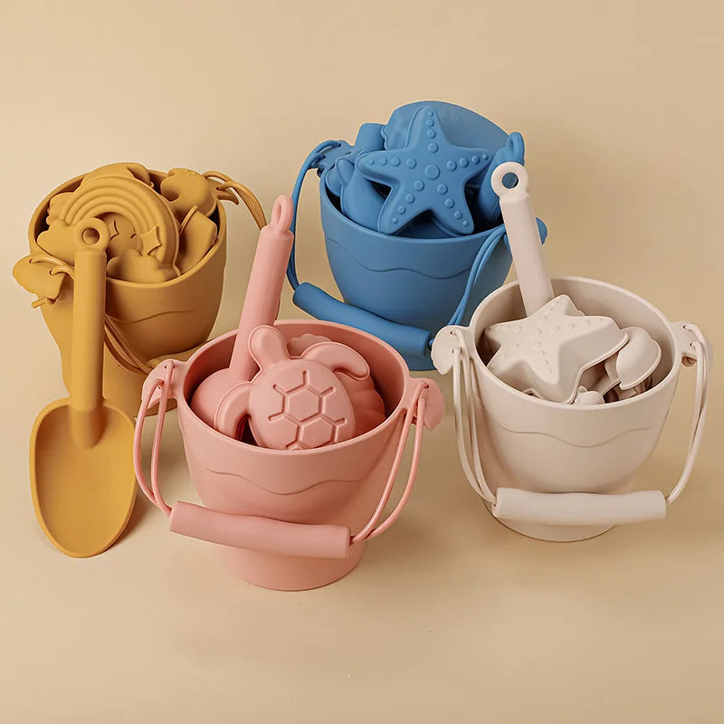 Flexible, durable silicone sand play set for children, easy to pack for beach trips & outdoor fun.