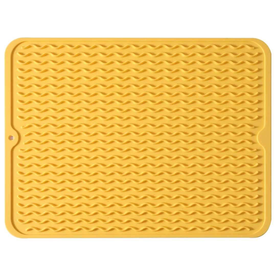 Durable silicone kitchen mat, great for drying dishes, protecting counters. Heat resistant & eco-friendly.