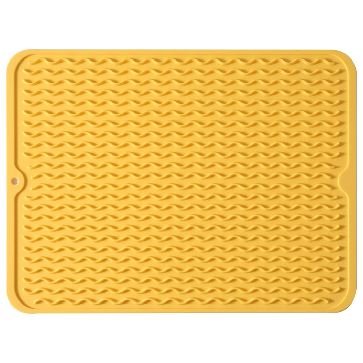 Durable silicone kitchen mat, great for drying dishes, protecting counters. Heat resistant & eco-friendly.