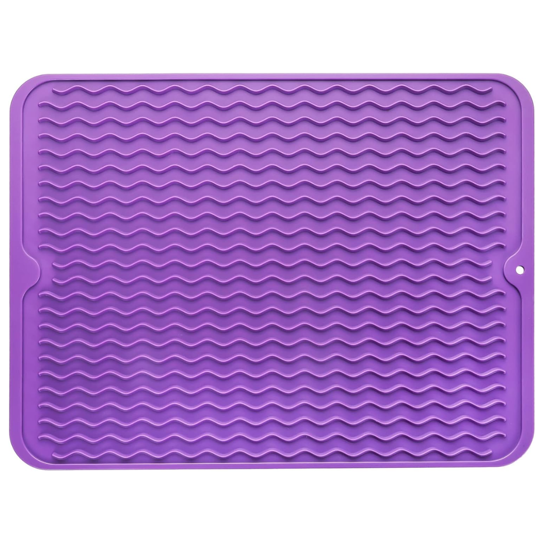 Practical silicone drying mat for kitchen counters. Use for dishes, hot pots, or as a drawer liner.