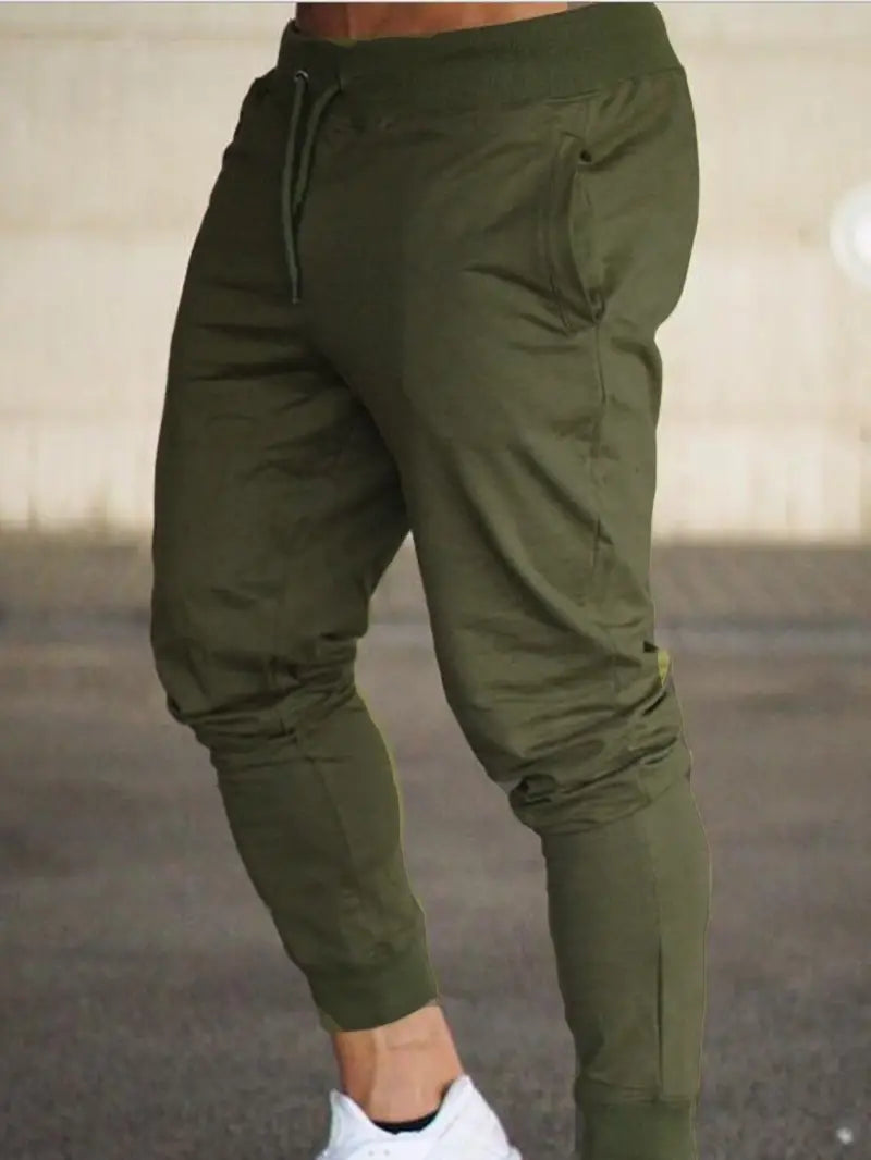 Red men's comfortable jogger pants, relaxed fit design, excellent for men's fashion, active or casual wear.