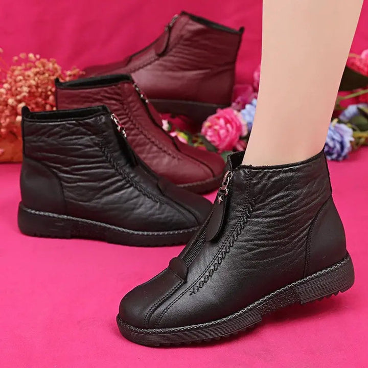 Slip-resistant women's ankle boots. Durable winter footwear providing secure traction & warm comfort for cold days.