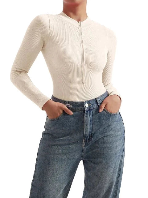 Stylish women's ribbed long sleeve zip-up swimsuit. Versatile one-piece for swimwear, beach, and resort fashion.