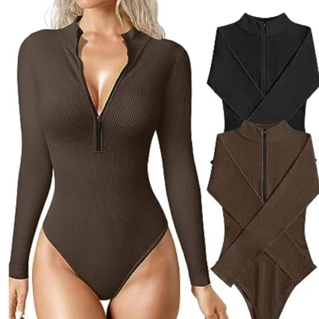 Chic women's long sleeve ribbed zip-up swimsuit. A flattering one-piece for swimwear, beach, or resort.