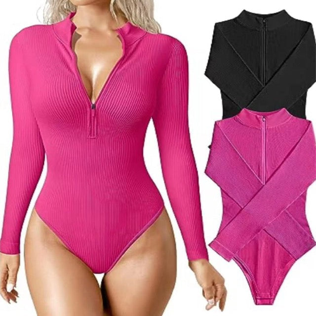 Comfortable women's ribbed long sleeve zip-up one-piece swimsuit. Perfect for sun protection & active beachwear.