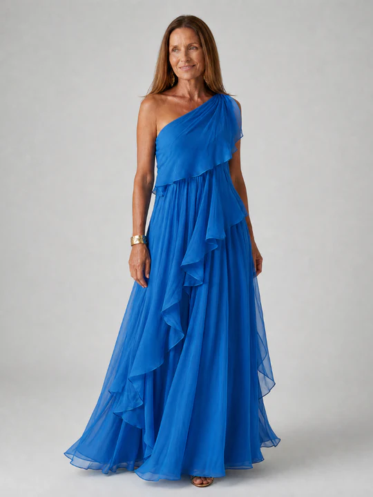 Chic party dress for women, featuring a flattering asymmetric cut and elegant ruffle details.