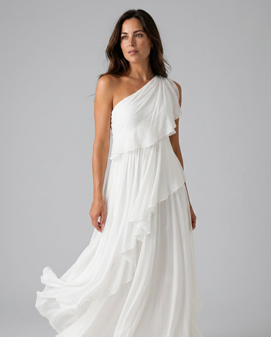 Back view of a women's sophisticated asymmetric ruffle maxi dress, showcasing its elegant silhouette.