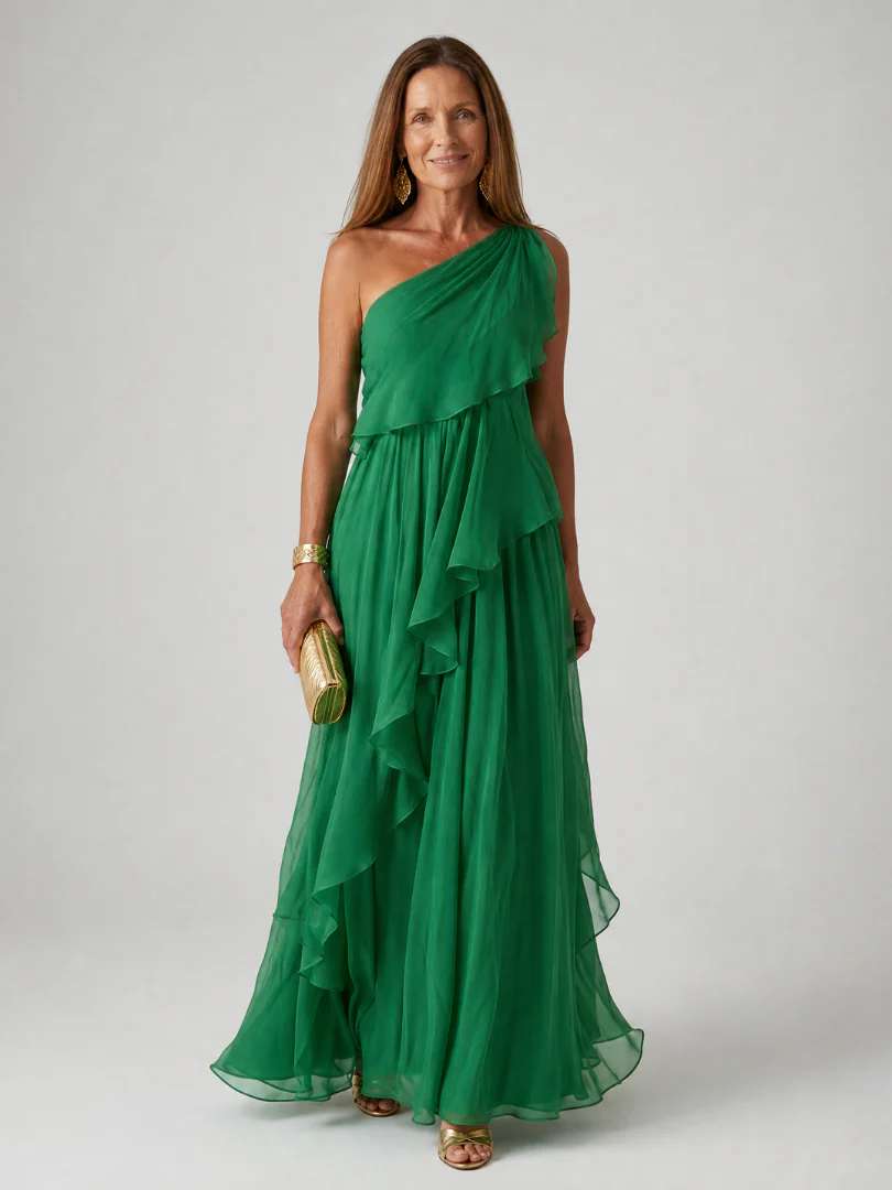 Beautiful flowy maxi dress for women, with elegant asymmetric ruffles, ideal for wedding guests.