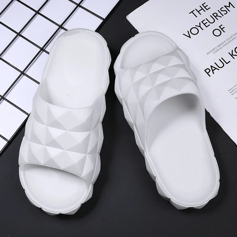 Designer-look men's geometric textured slides, perfect for stylish summer footwear.