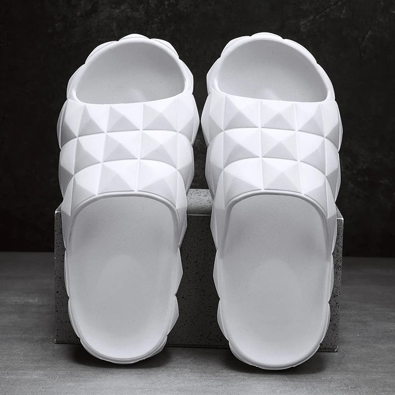 Contemporary men's slip-on sandals, with a geometric texture for ultimate comfort.