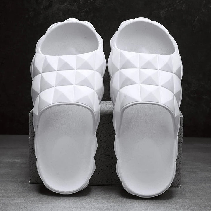 Contemporary men's slip-on sandals, with a geometric texture for ultimate comfort.