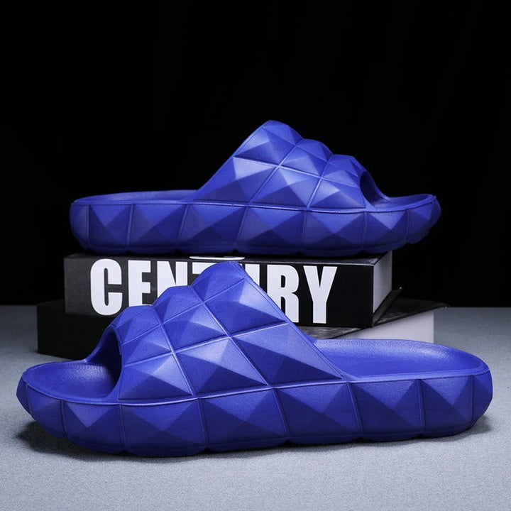 Stylish men's slip-on slides with a modern geometric texture, ideal for beach or pool.