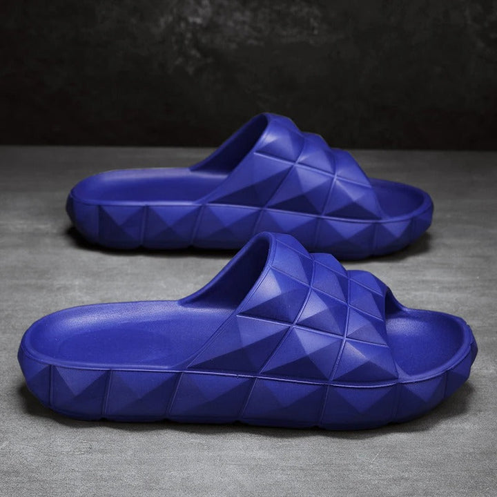 Men's comfort slides with a chic geometric textured design, great for summer footwear.