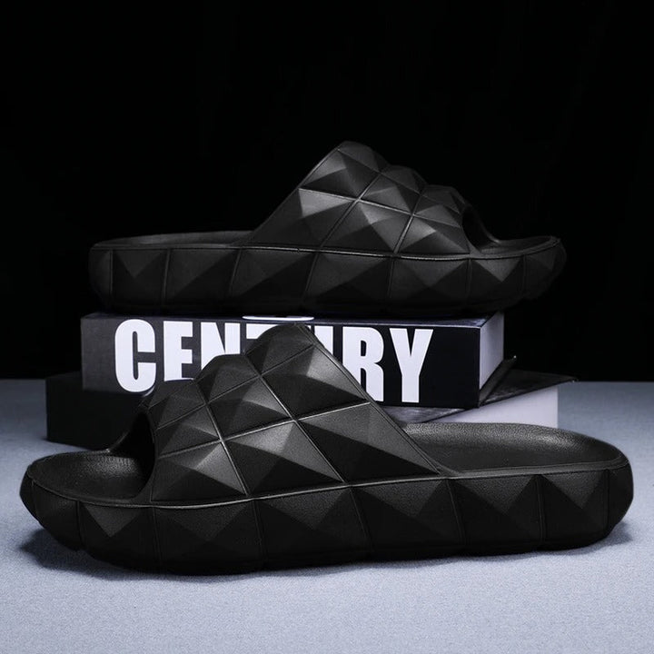 Geometric textured men's slides, offering ultimate comfort for pool or beach.