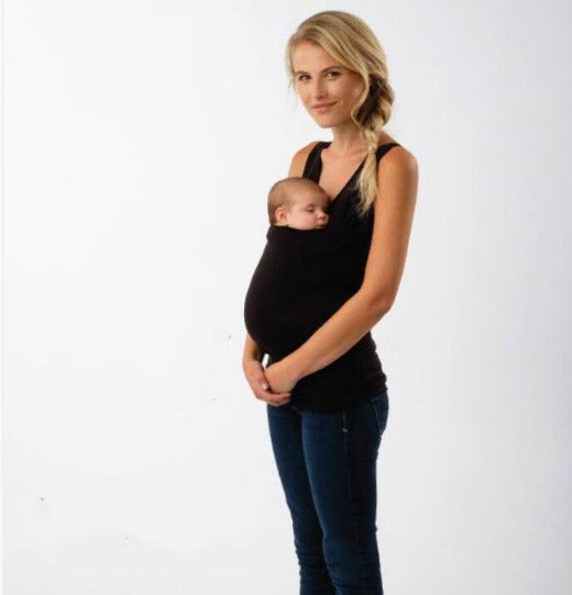 Soft, breathable fabric on an ergonomic babywearing T-shirt, perfect for comfortable infant carrying & bonding.