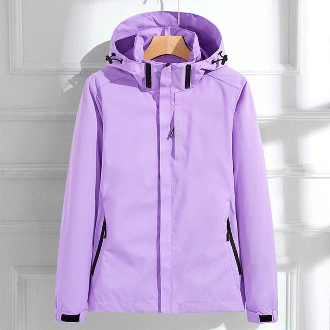 Durable women's waterproof outerwear, featuring an adjustable hood & secure fit. Great for casual & travel wear.