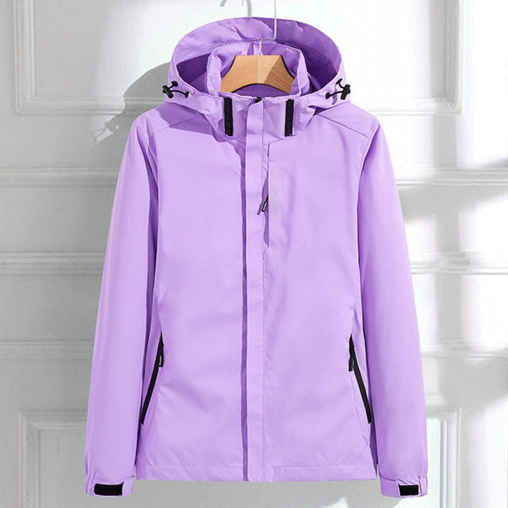 Durable women's waterproof outerwear, featuring an adjustable hood & secure fit. Great for casual & travel wear.