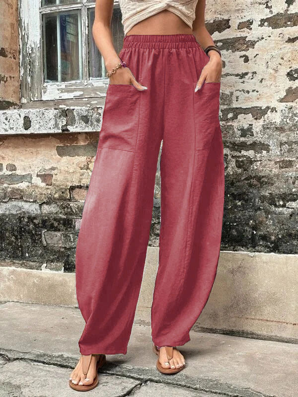 Comfortable waistband detail of women's wide-leg palazzo trousers, ensuring a relaxed fit and easy wear.