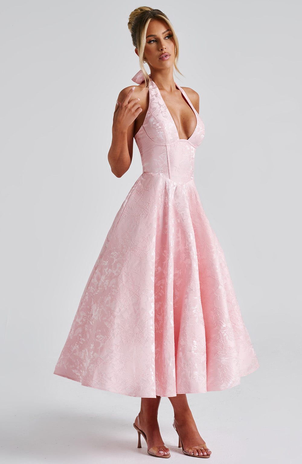 Chic women's halter neck midi dress, ideal for sophisticated party or cocktail events.