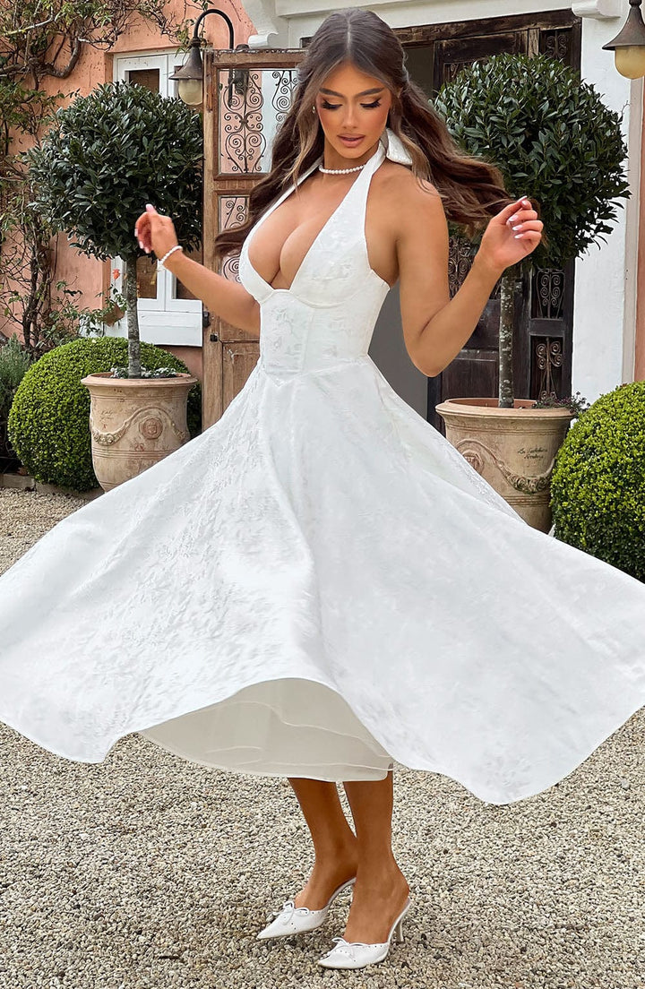 Beautiful women's halter midi dress, ideal for a wedding, cocktail party, or formal event.